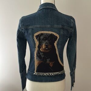 A FroggyBottomDesign denim jacket with dog patch on the back